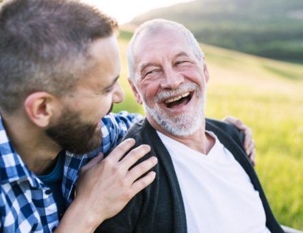 carer laughing with cared for