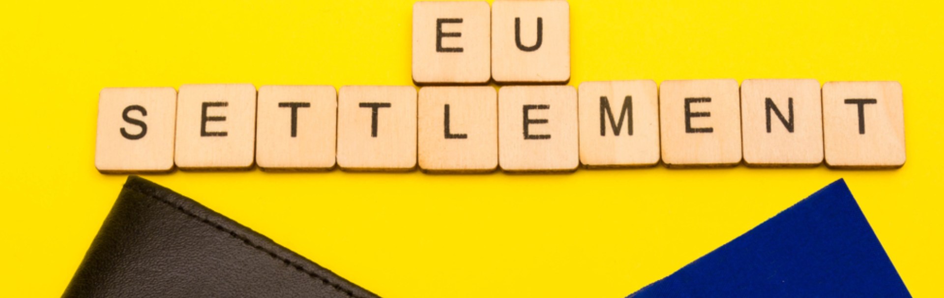 EU Settlement Scheme banner written out in scrabble letters