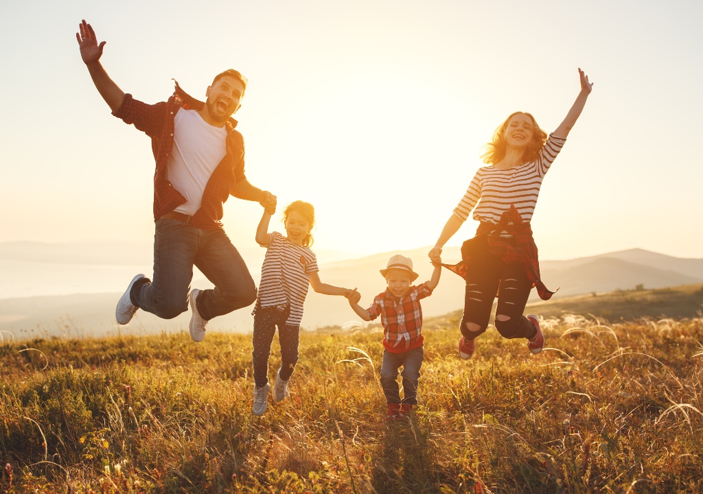 Happy family jumping