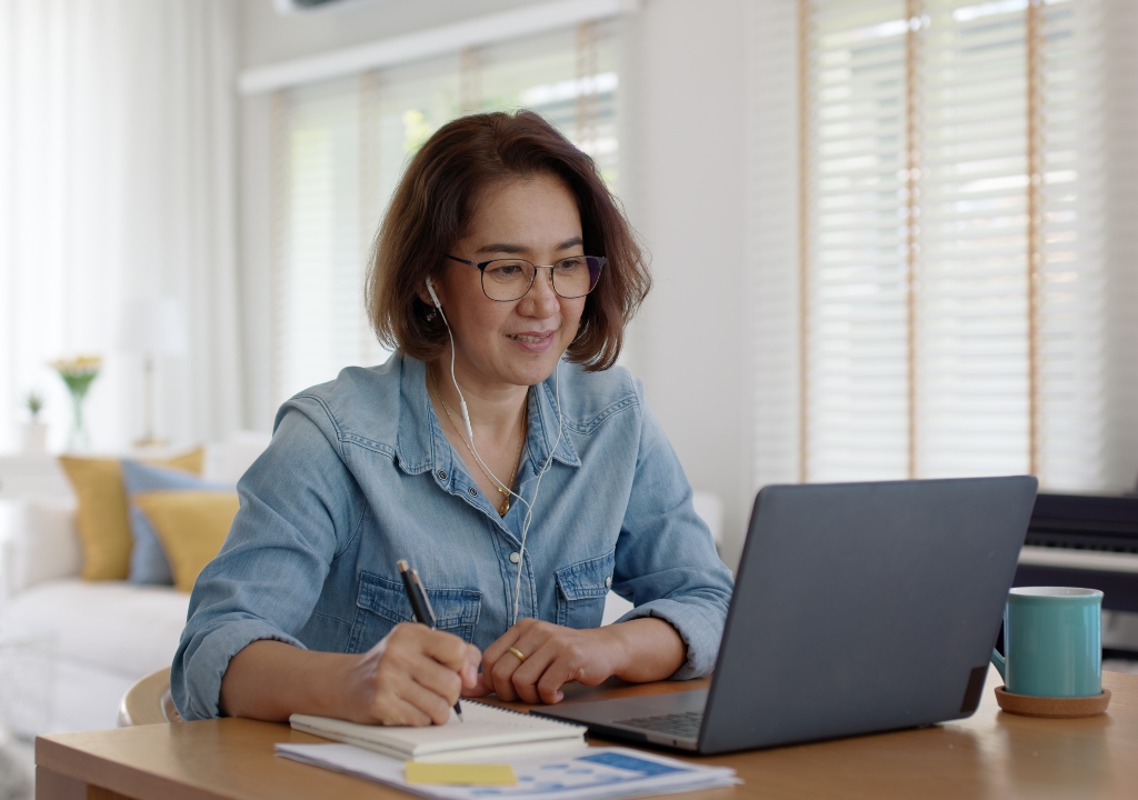 Woman learning at a computer