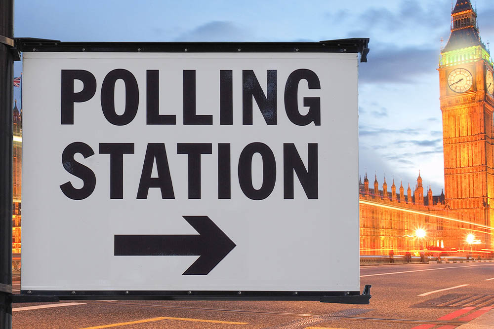 A sign in Westminster saying 'Polling Station" with an arrow.